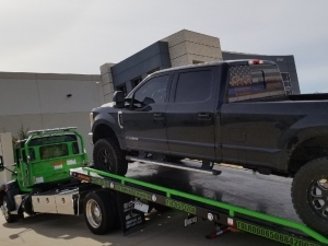 Towing a Truck from Dallas to Arlington to Replace a Bent Rim