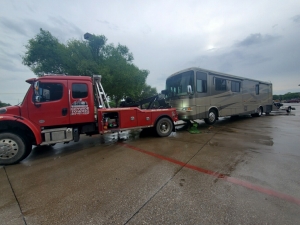 Towing an RV towing a motorbike on a trailer from Dallas to Garland, TX
